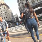 ButtArg Latina listening to music in the street