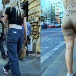 Blonde Girl in Shorts Hungry On British Street
