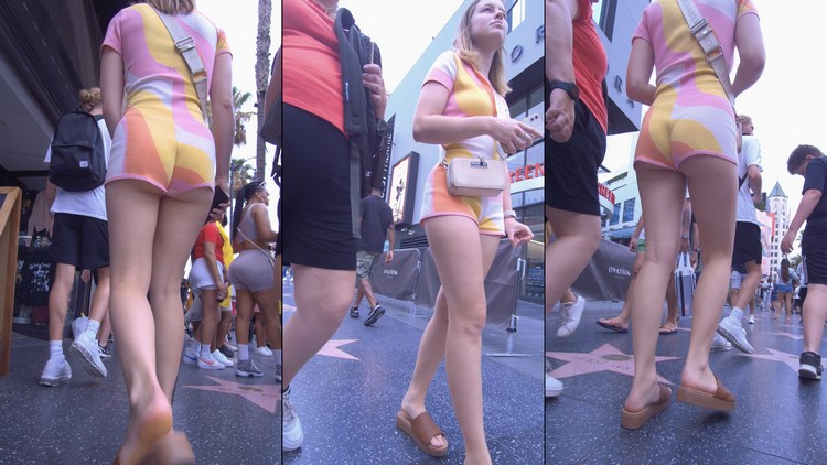 A Sexy Blonde in Shorts with Beautiful Legs