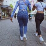 Scratchy Shooter Two Friends Walking in Jeans